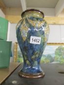 A Royal Doulton vase.