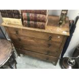 A 1930's oak chest of drawers