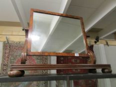 A large Victorian mahogany swing toilet mirror.
