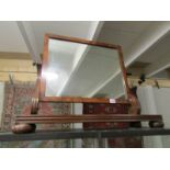 A large Victorian mahogany swing toilet mirror.