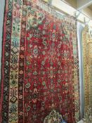 A long red patterned rug,.