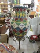 A continental vase on stand.