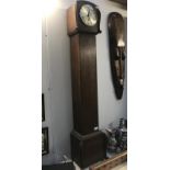 An Edwardian oak Westminster chime grandmother clock