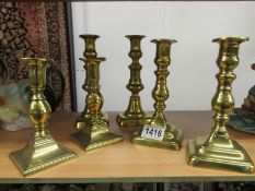 3 pairs of Victorian brass candlesticks.