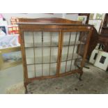 A mahogany display cabinet.