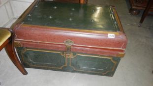A good old painted tin trunk.