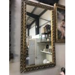 A gilt framed mirror