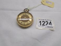An 18ct gold dress pocket watch (H.M 18K).