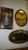 A Coca Cola mirror and 2 others.