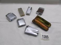 6 assorted cigarette lighters including Ronson together with a cigar holder in case.