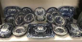 A large quantity of blue and white dinnerware including F & Sons LTD.