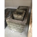 2 concrete garden planters