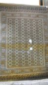 A beige ground Bokhara rug, 230 x 90 cm.