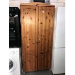 A pine 2 door wardrobe