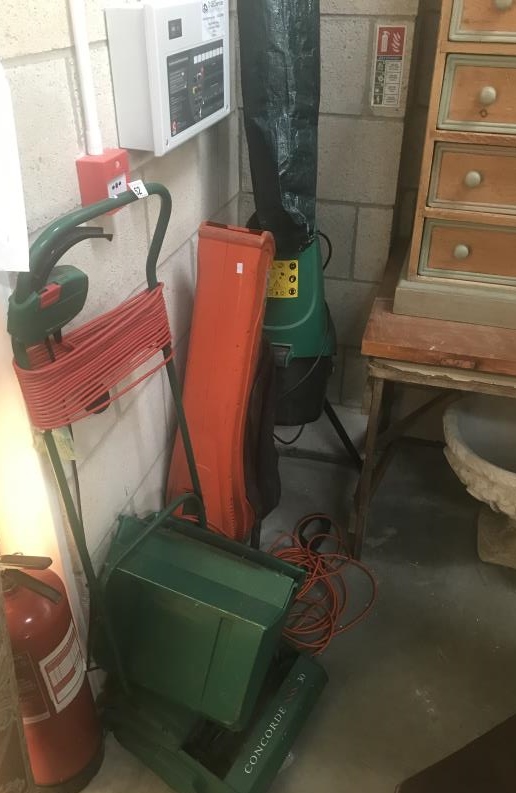 A quantity of electric garden tools including mower, blower,