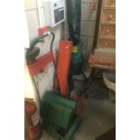 A quantity of electric garden tools including mower, blower,