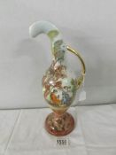 A 19th century hand painted ewer with romantic scene, 30 cm tall.
