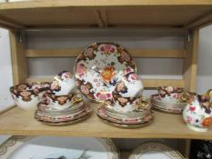 22 pieces of early 20th century china tea ware.