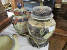 An oriental style table lamp base and a ginger jar.