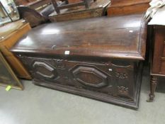 A large period carved domed top coffer.