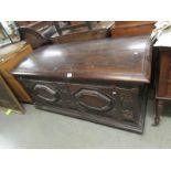 A large period carved domed top coffer.