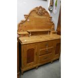 A Lincolnshire pine dresser with carved back.