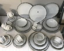 A 34 piece Seyei dinner set and an 18 piece Royal Standard tea set