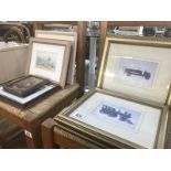 A quantity of framed and glazed prints