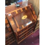 A modern bureau with inlaid flap