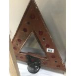 A vintage reflective warning triangle road sign post topper