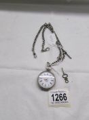 A Victorian ladies silver fob watch (not working) on a silver chain, (chain 48 grams.).