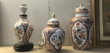 2 oriental style lidded jars and a table lamp base.