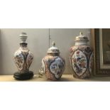 2 oriental style lidded jars and a table lamp base.