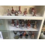 A quantity of oriental vases including Kutani and Satsuma