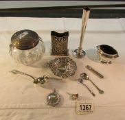 A silver match box holder (Birmingham hall mark), a silver spill vase, a silver sifter spoon,