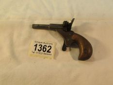 A late 19th century ladies garter gun (deactivated).