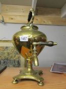 A brass samovar urn.