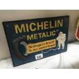 A cast iron Michelin Metallic advertising sign