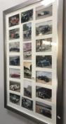 A large framed collage of pictures of vintage & classic cars