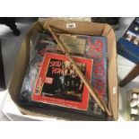 A box of "Skid Row" records and ephemea, Bon Jovi, Micheal Jackson records etc.