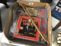 A box of "Skid Row" records and ephemea, Bon Jovi, Micheal Jackson records etc.
