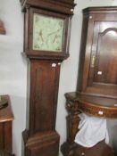 An oak 30 hour long case clock marked Hargreaves, Settle.