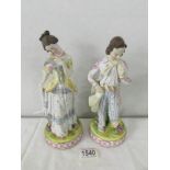 A pair of 19th century bisque porcelain figures. 24 cm tall.