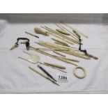 A large quantity of bone and ivory sewing and other implements.