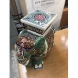 A large pottery elephant plant stand