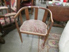 A mahogany inlaid chair.