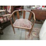 A mahogany inlaid chair.