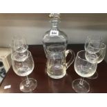 A decanter and jug,