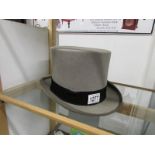A Young's grey top hat, size 6 7/8 inches.