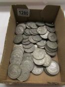 Approximately 1100 grams of pre 1947 silver half crowns.